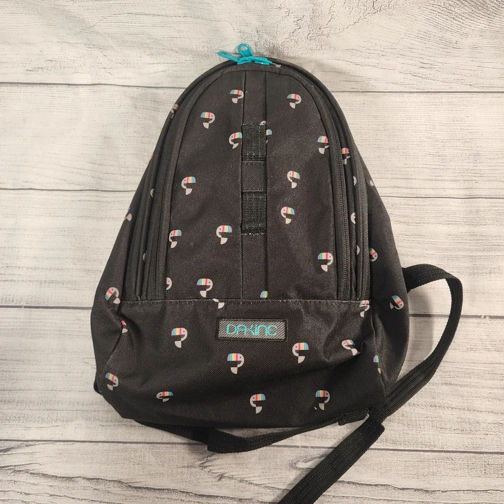 Dakine Cosmo 6.5L Mini Backpack Black Rainbow Toucan Pattern 8210060 Daypack